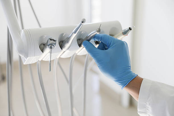 Professional Tooth Extraction technician working in Farmland, IN